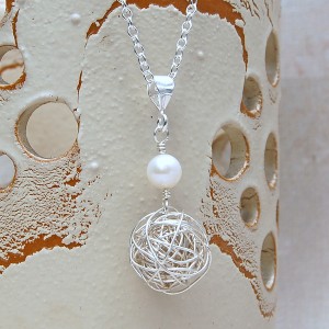 Silver Birds Nest and Pearl Necklace